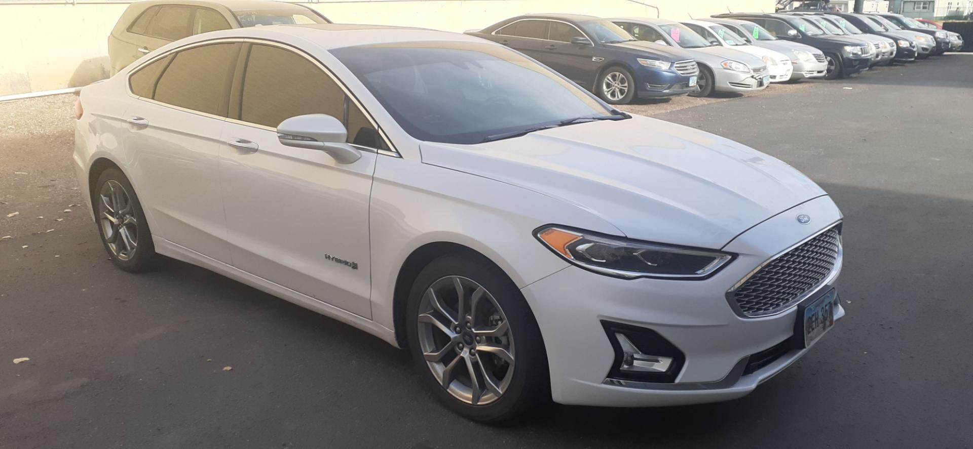 2019 Ford Fusion Hybrid Titanium (3FA6P0RU3KR) with an 2.0L L4 DOHC 16V HYBRID engine, CVT transmission, located at 2015 Cambell Street, Rapid City, SD, 57701, (605) 342-8326, 44.066433, -103.191772 - CARFAX AVAILABLE - Photo#7